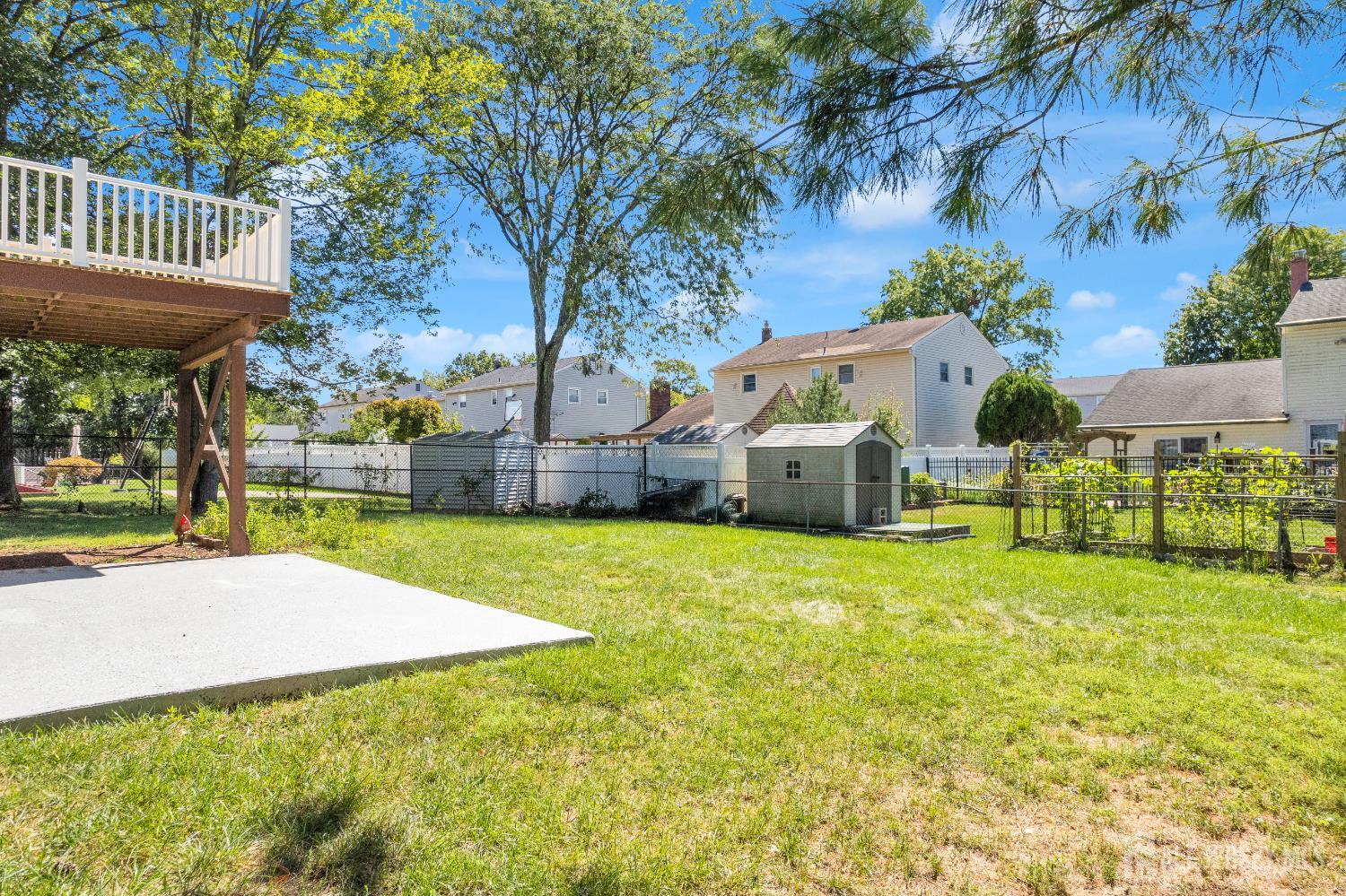6 Marc Court Edison, NJ 08820 - Photo 39 of 42 a view of a house with backyard and sitting area
