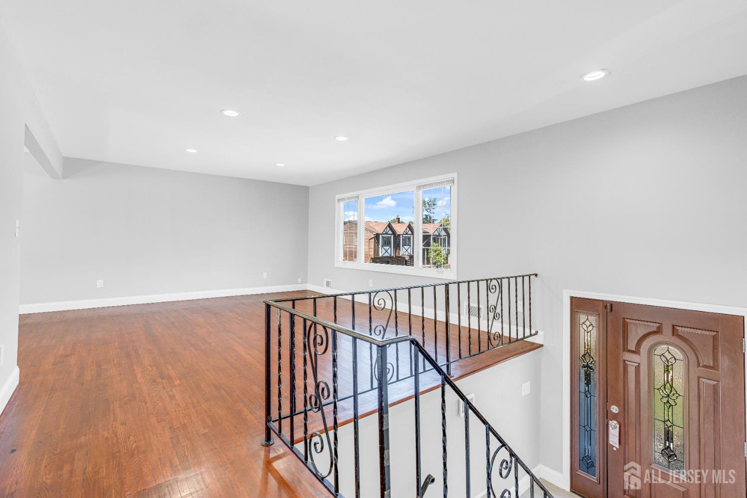 6 Marc Court Edison, NJ 08820 - Photo 5 of 42 a view of entryway with wooden floor