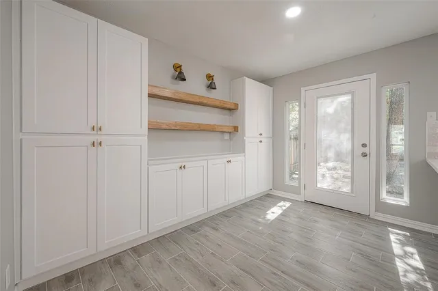 a view of an empty room and window