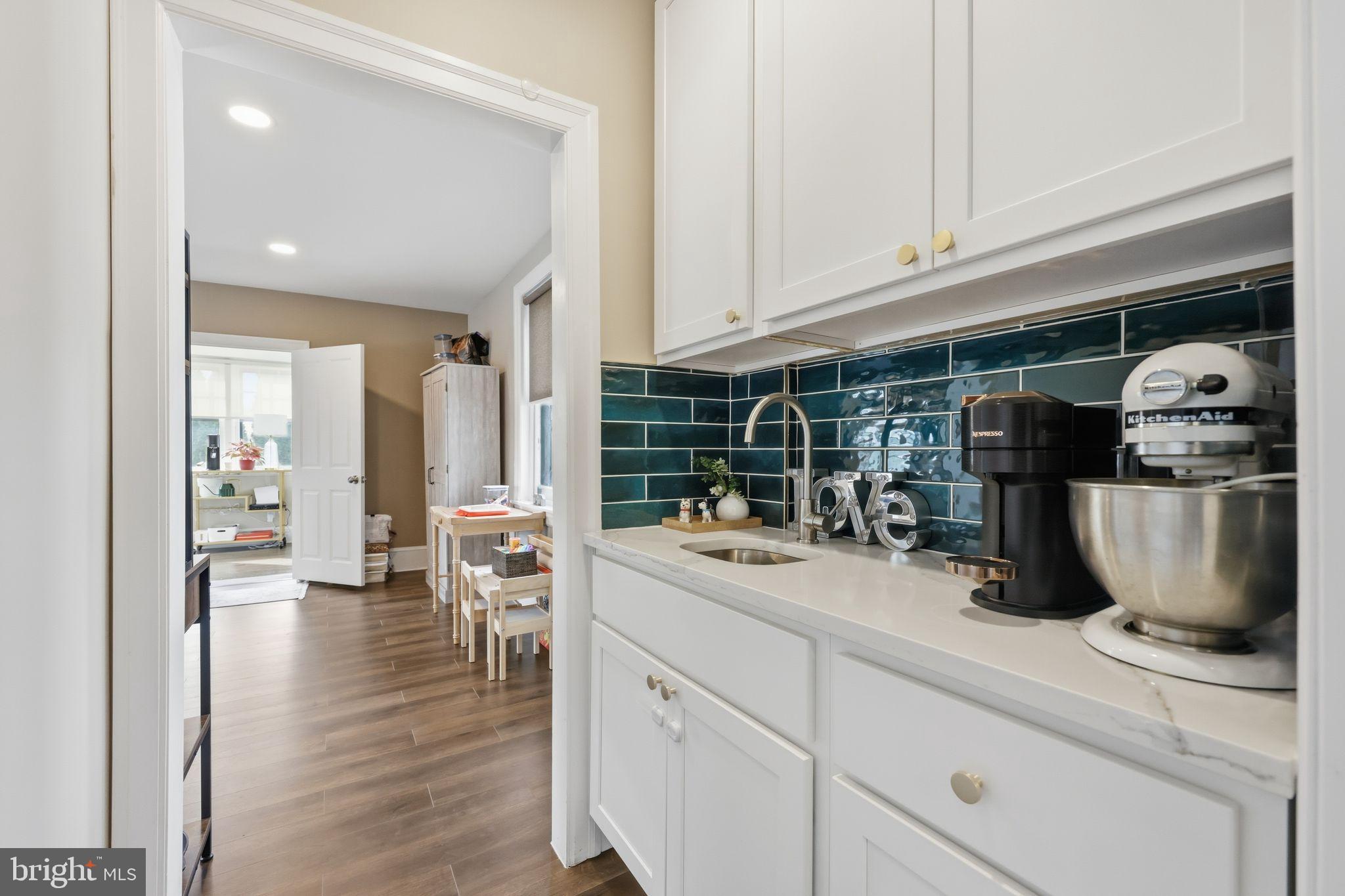 126 North Providence Road Media, PA 19063 - Photo 5 of 28 a kitchen with a sink a stove and cabinets
