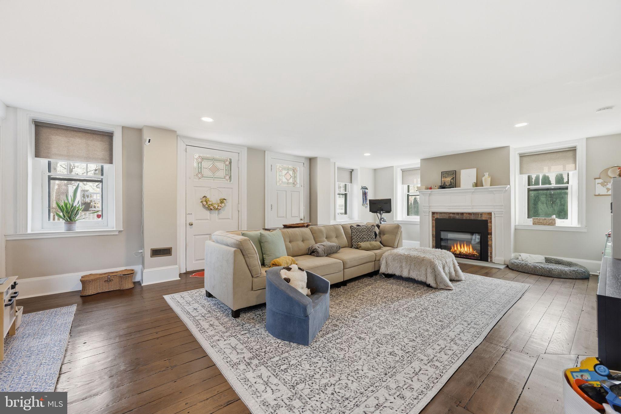 126 North Providence Road Media, PA 19063 - Photo 9 of 28 a living room with furniture and a fireplace