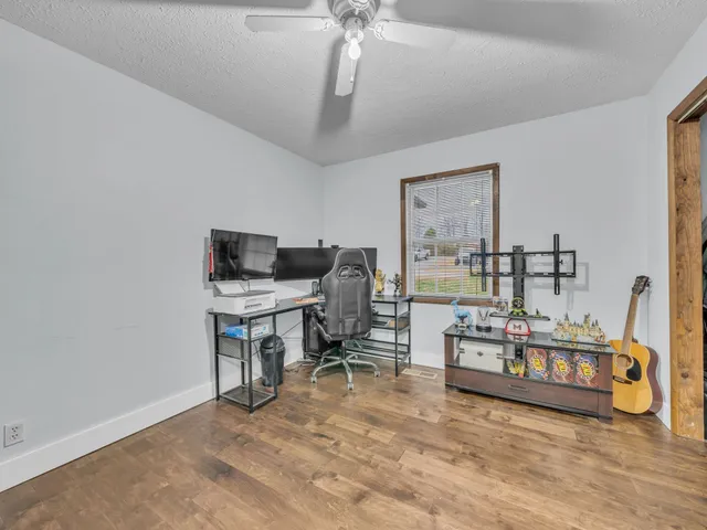 a living room with furniture and a table