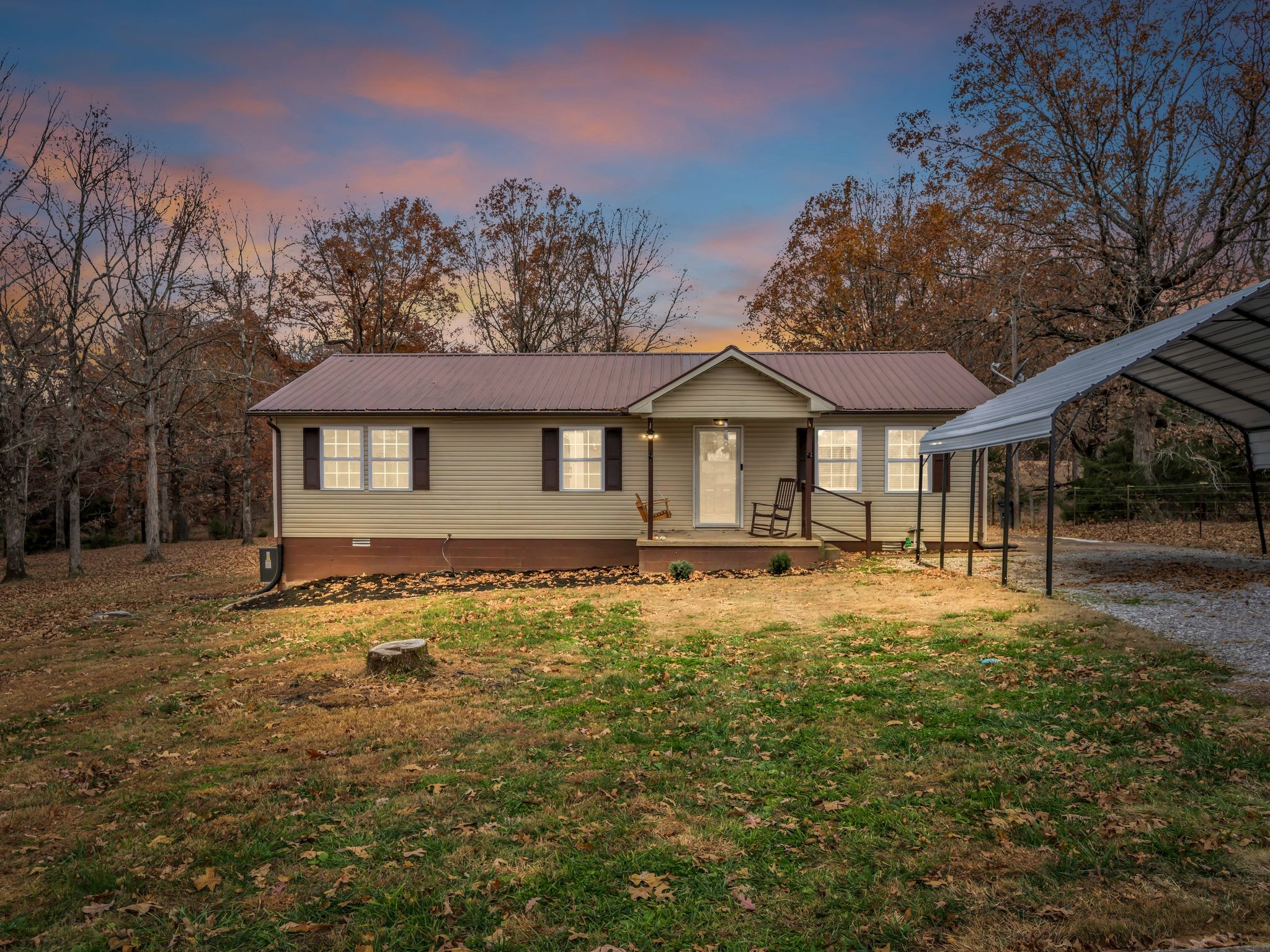 4055 Erin Road McEwen, TN 37101 - Photo 20 of 25 a front view of a house with a garden