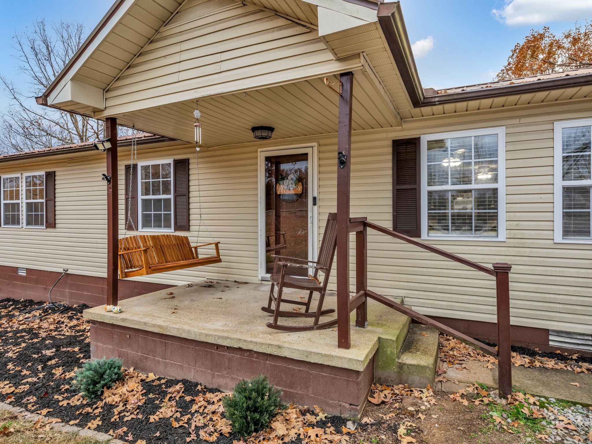 4055 Erin Road McEwen, TN 37101 - Photo 2 of 25 a view of a house with backyard and sitting area