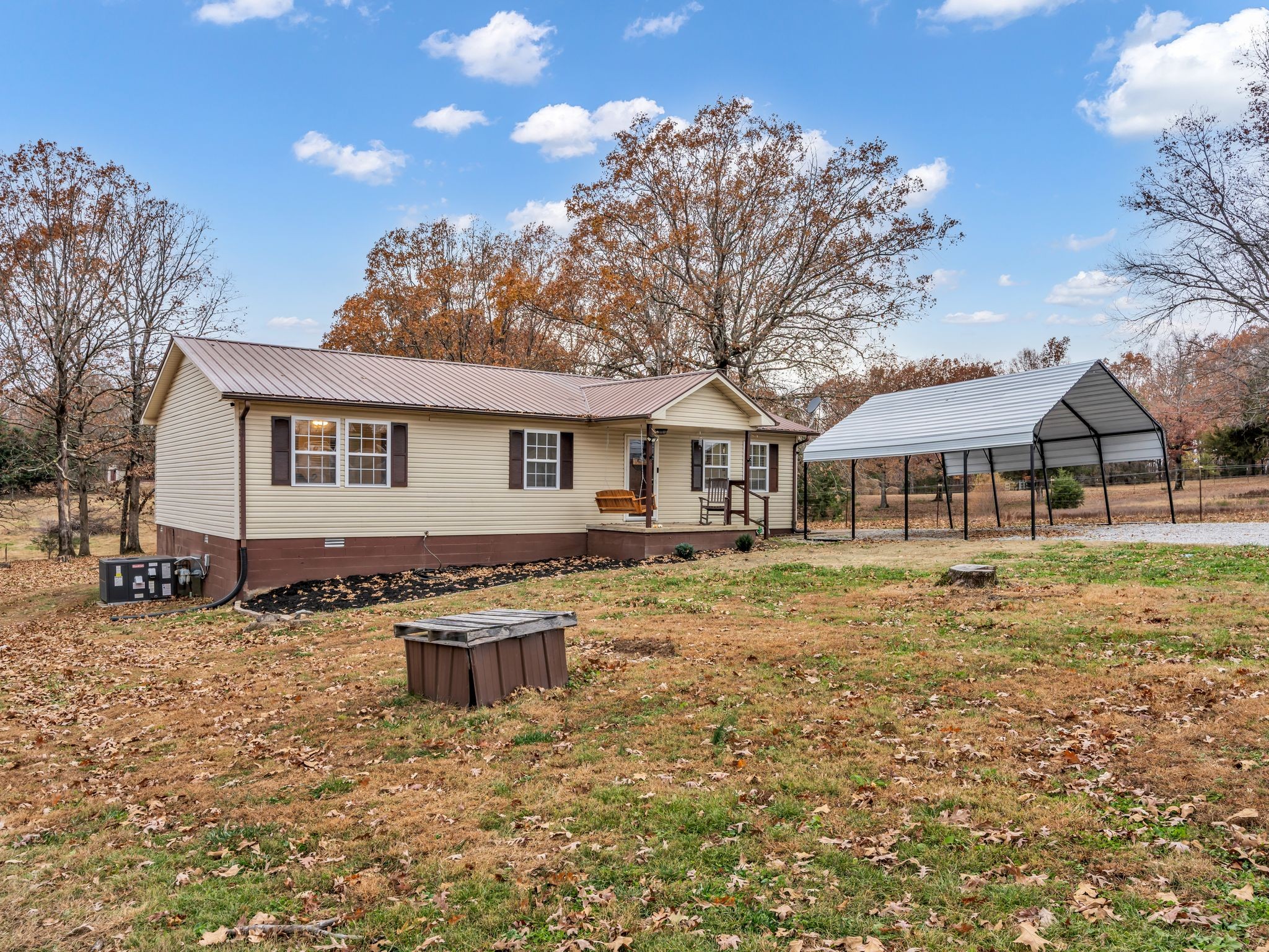 4055 Erin Road McEwen, TN 37101 - Photo 21 of 25 a front view of a house with a yard