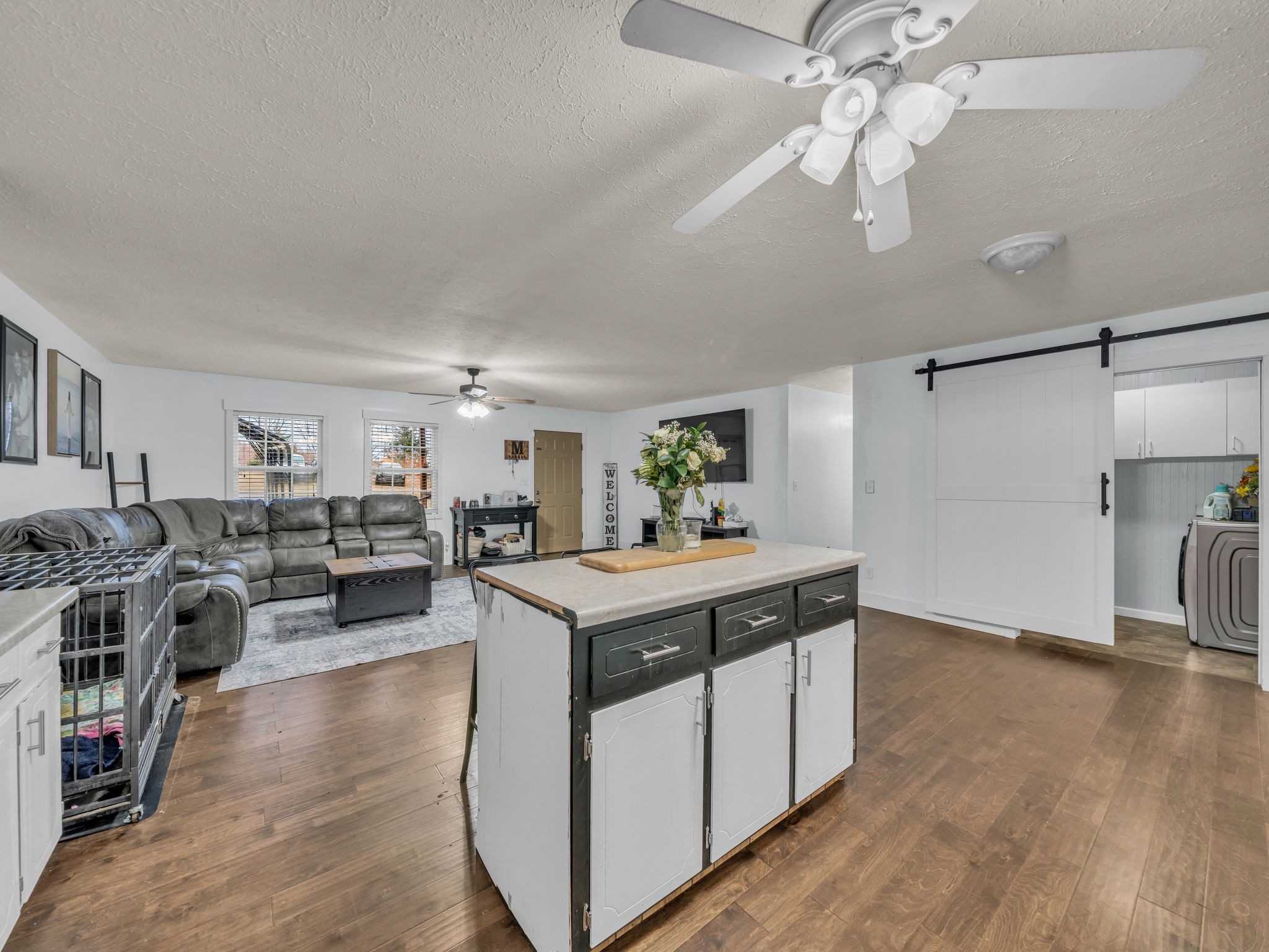 4055 Erin Road McEwen, TN 37101 - Photo 9 of 25 a view of living room with kitchen island furniture and ceiling fan