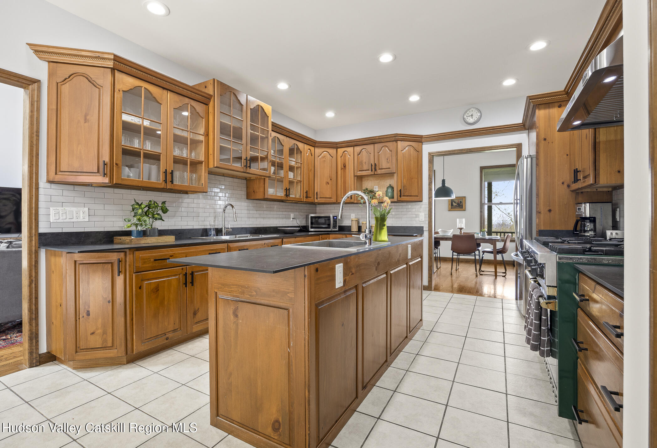 350 Taghkanic Road Elizaville, NY 12523 - Photo 13 of 36 a kitchen with stainless steel appliances granite countertop a stove a sink and a microwave