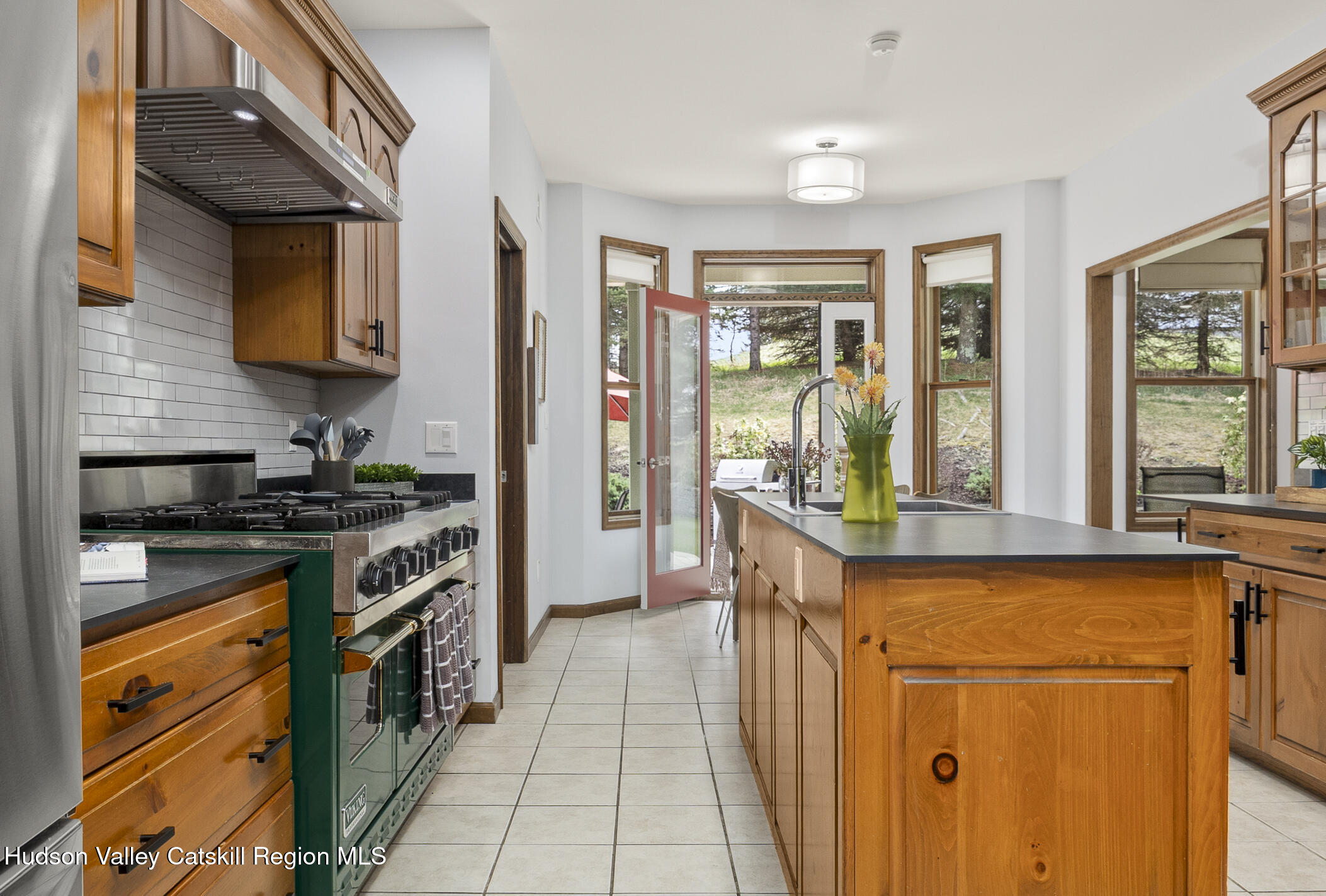 350 Taghkanic Road Elizaville, NY 12523 - Photo 14 of 36 a kitchen with stainless steel appliances granite countertop a stove and a sink