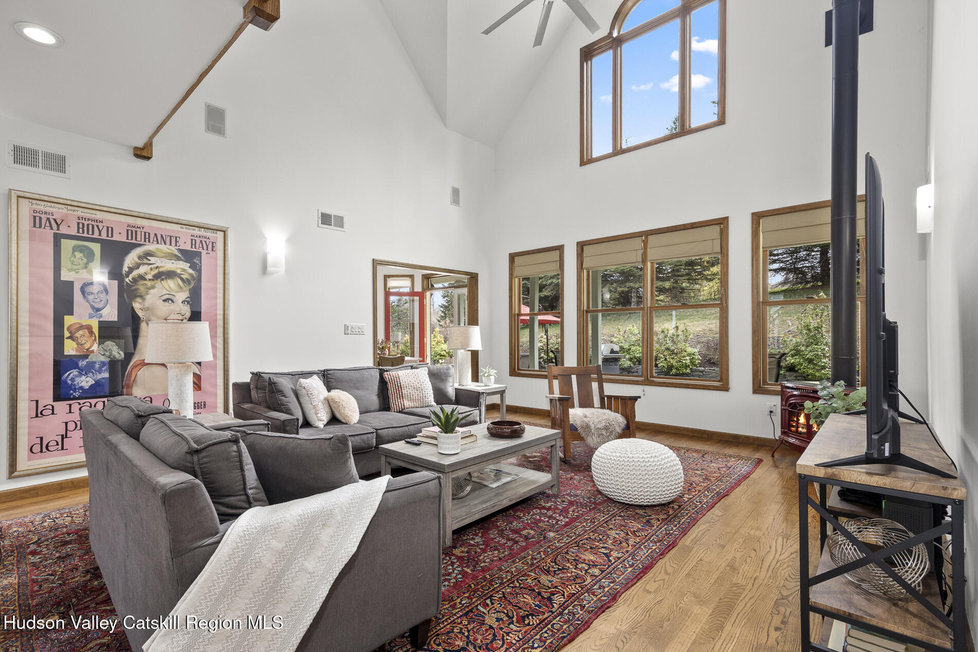 350 Taghkanic Road Elizaville, NY 12523 - Photo 2 of 36 a living room with furniture and a floor to ceiling window