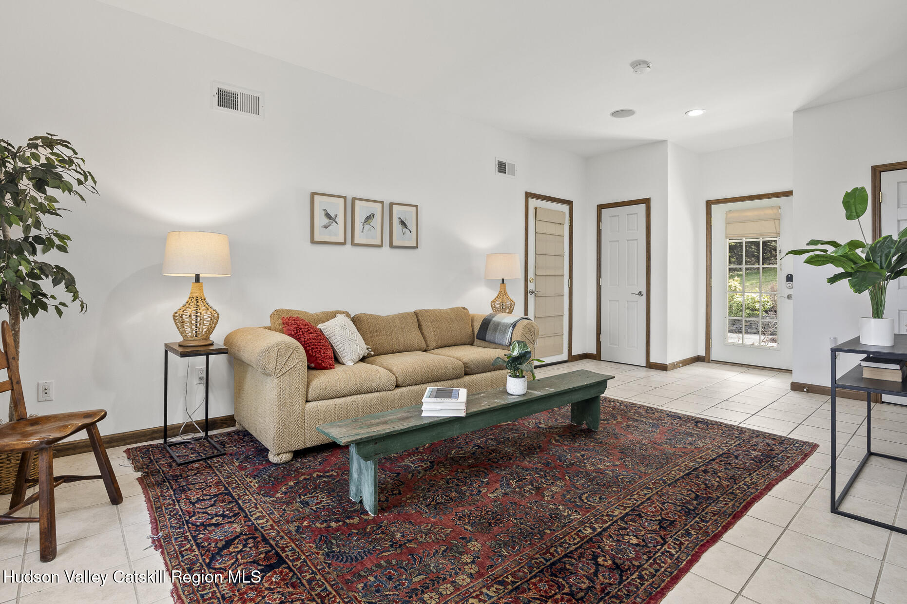 350 Taghkanic Road Elizaville, NY 12523 - Photo 22 of 36 a living room with furniture and a potted plant