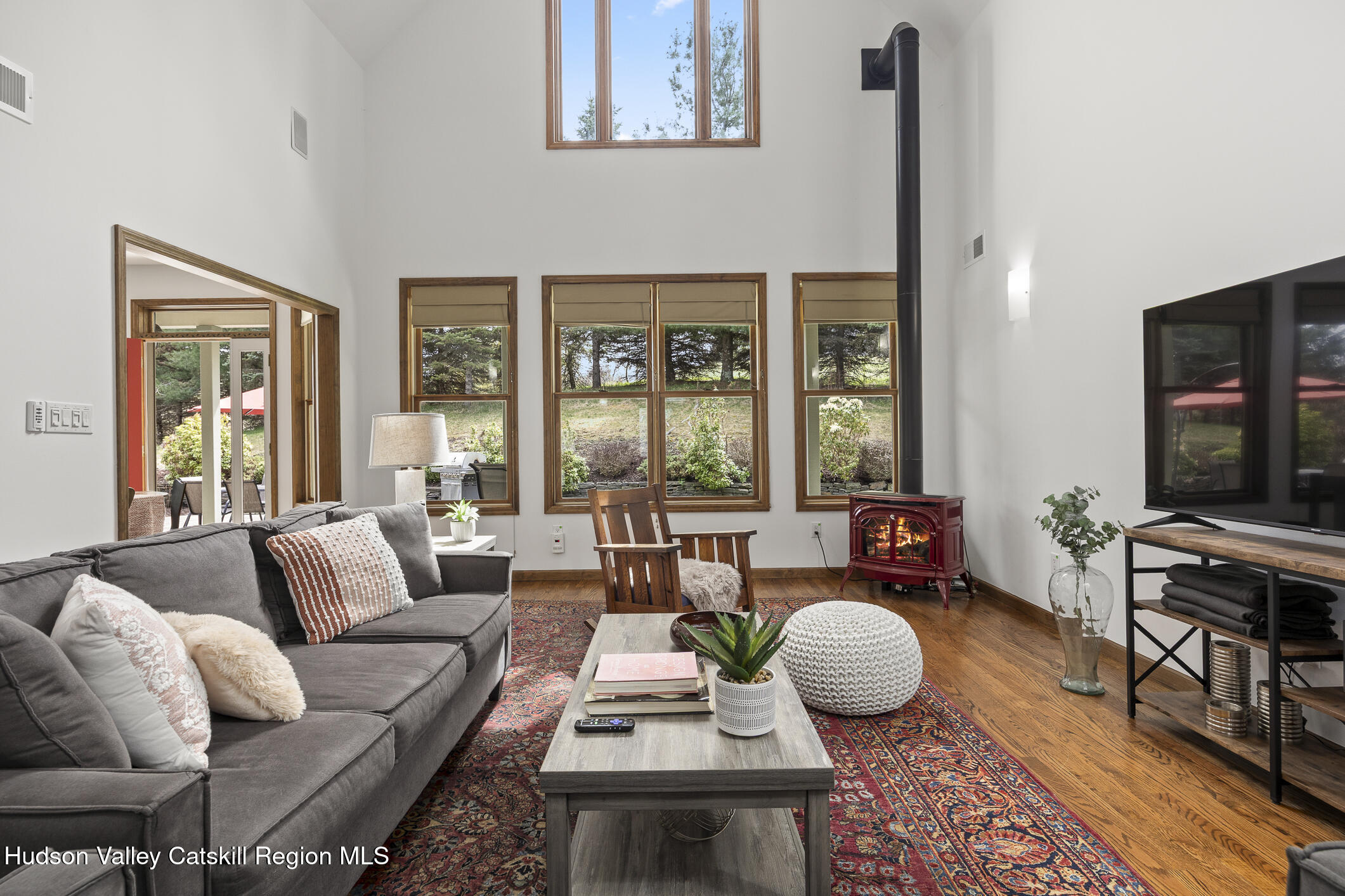 350 Taghkanic Road Elizaville, NY 12523 - Photo 7 of 36 a living room with furniture fireplace and flat screen tv