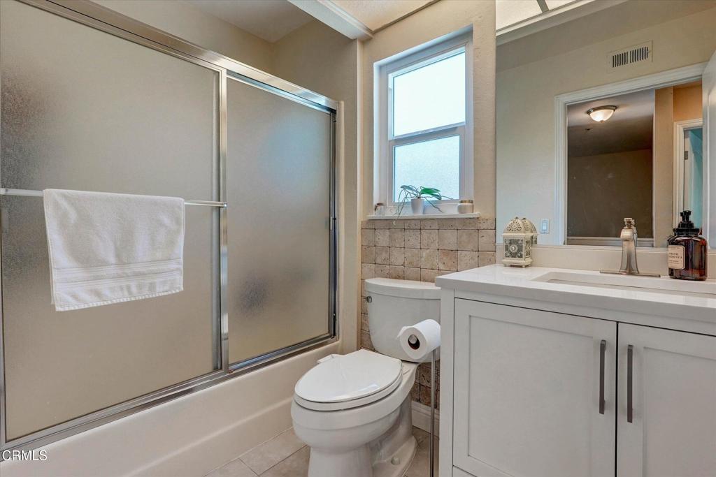12477 Rajah Street Los Angeles, CA 91342 - Photo 28 of 34 a bathroom with a sink toilet and shower