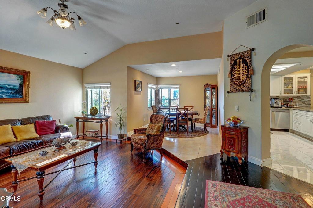 12477 Rajah Street Los Angeles, CA 91342 - Photo 9 of 34 a living room with furniture and wooden floor