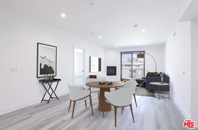 a workspace with furniture and wooden floor