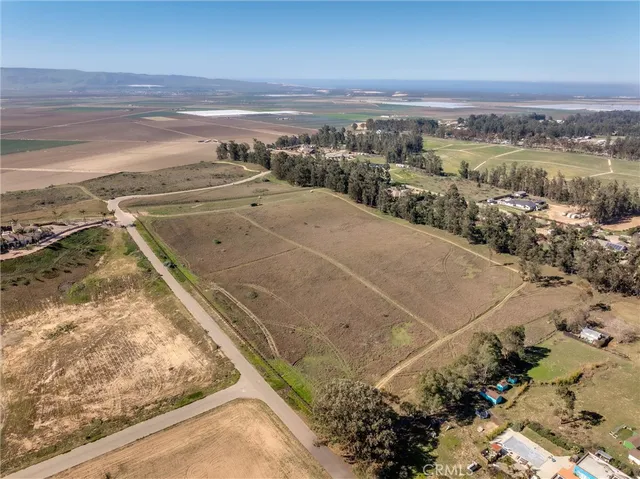 a view of an ocean and mountain