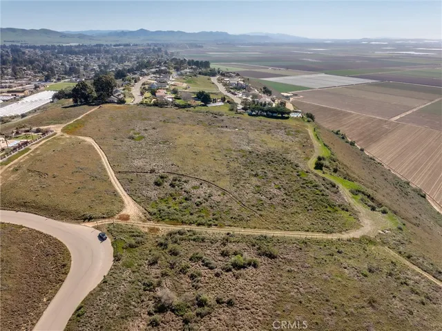 a view of a yard with an ocean