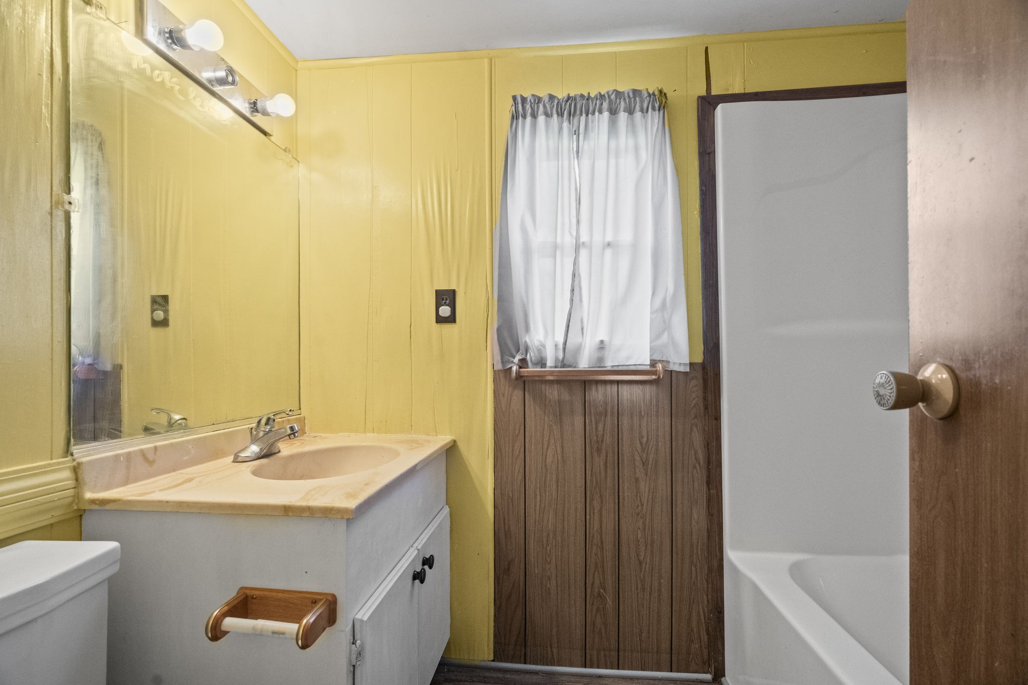 6214 Lincoln Park Road Springfield, TN 37172 - Photo 15 of 25 a bathroom with a sink a mirror and a shower