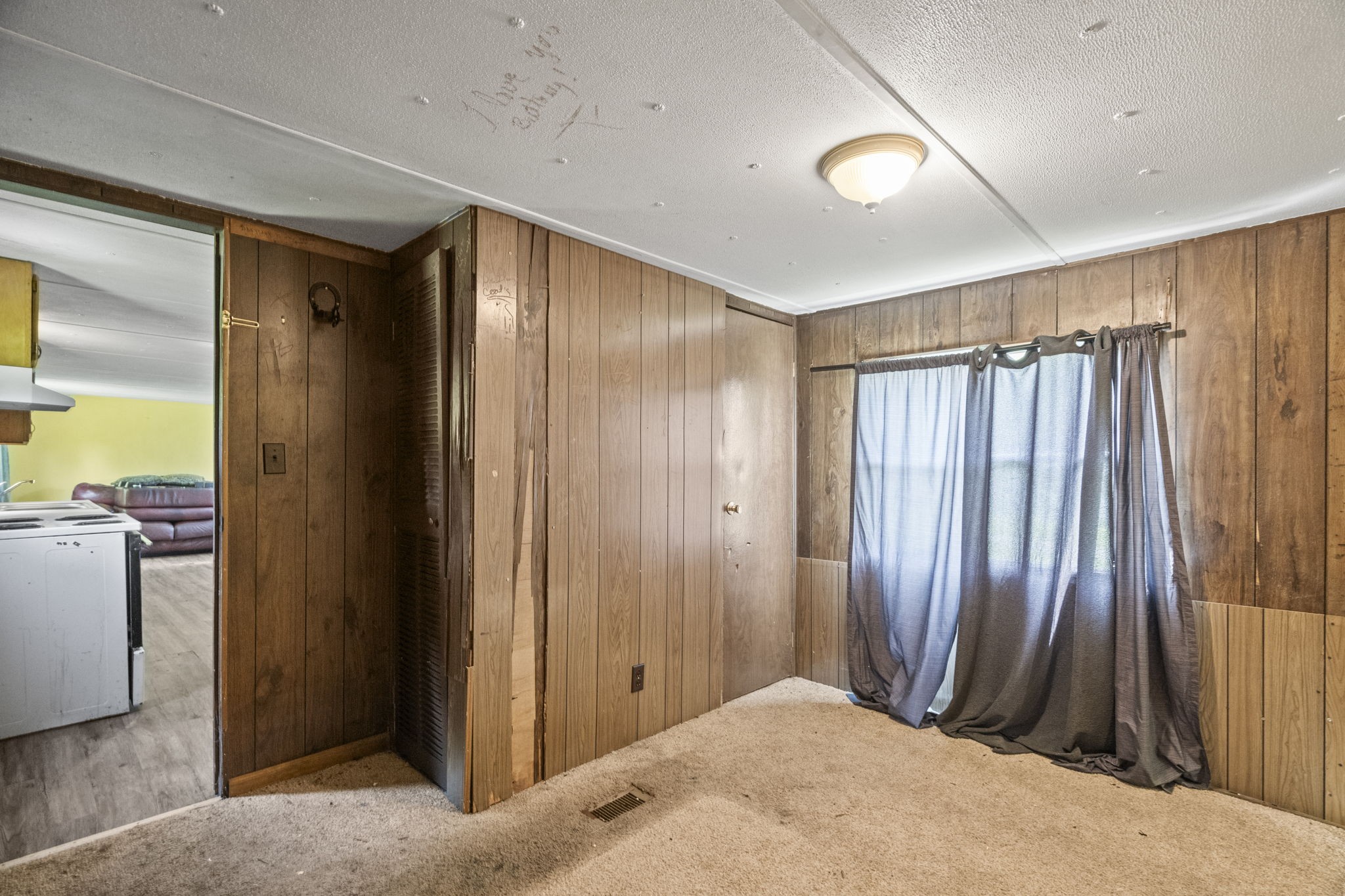 6214 Lincoln Park Road Springfield, TN 37172 - Photo 17 of 25 a view of a hallway with closet and furniture
