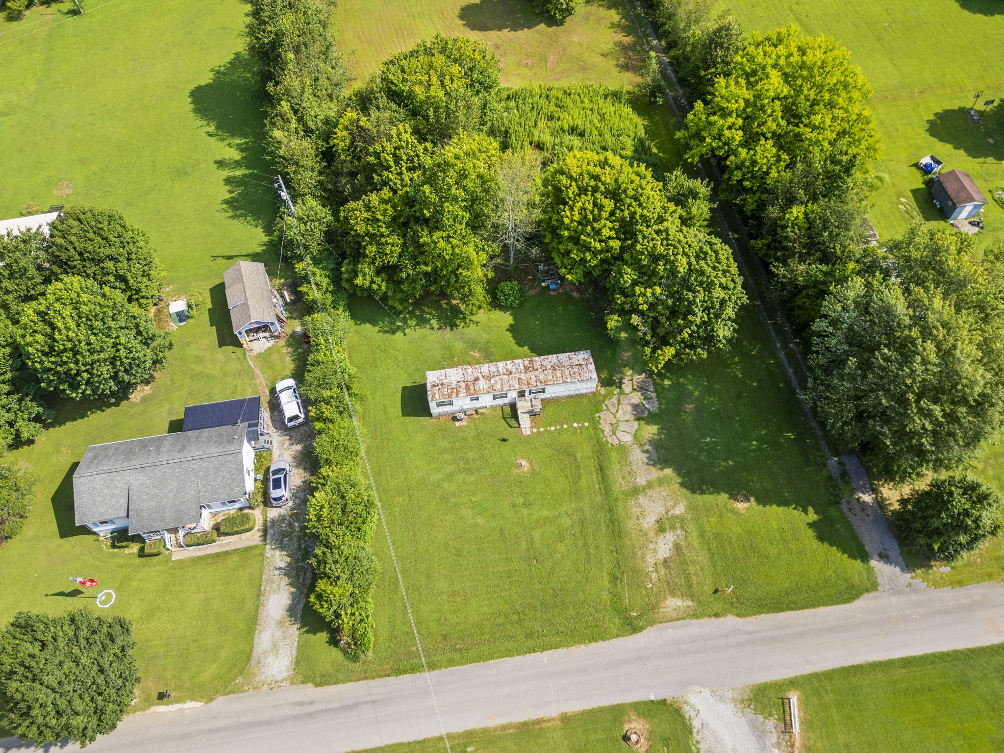 6214 Lincoln Park Road Springfield, TN 37172 - Photo 3 of 25 an aerial view of a residential houses with outdoor space and trees all around