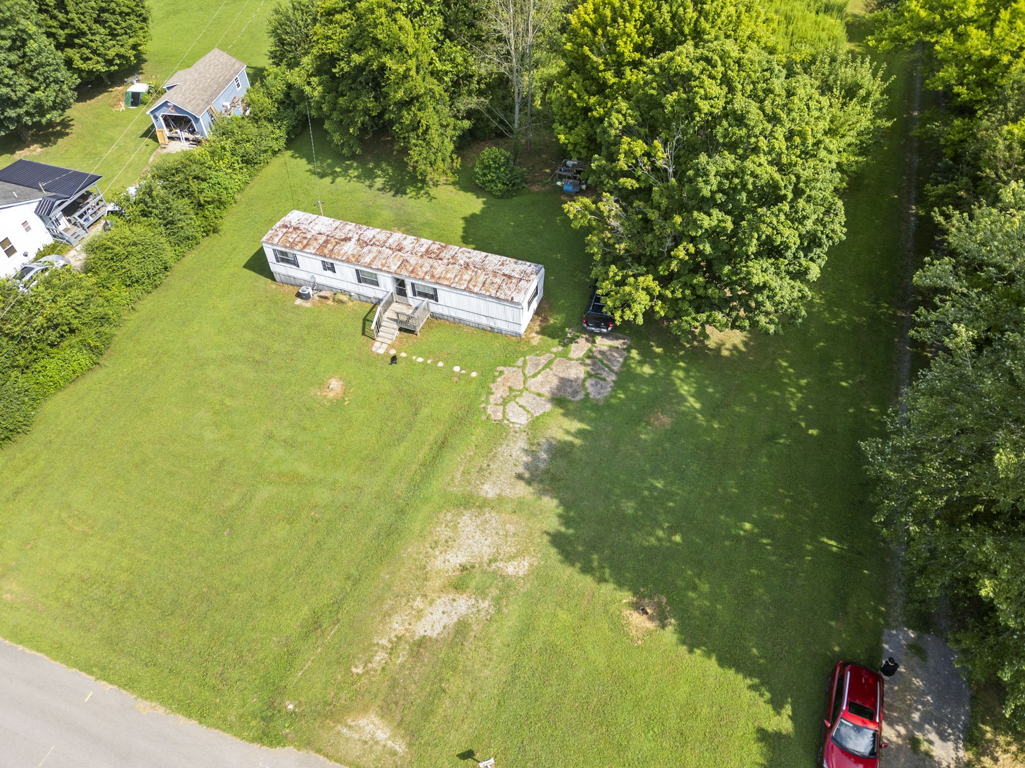 6214 Lincoln Park Road Springfield, TN 37172 - Photo 4 of 25 a view of a tree in a backyard of a house