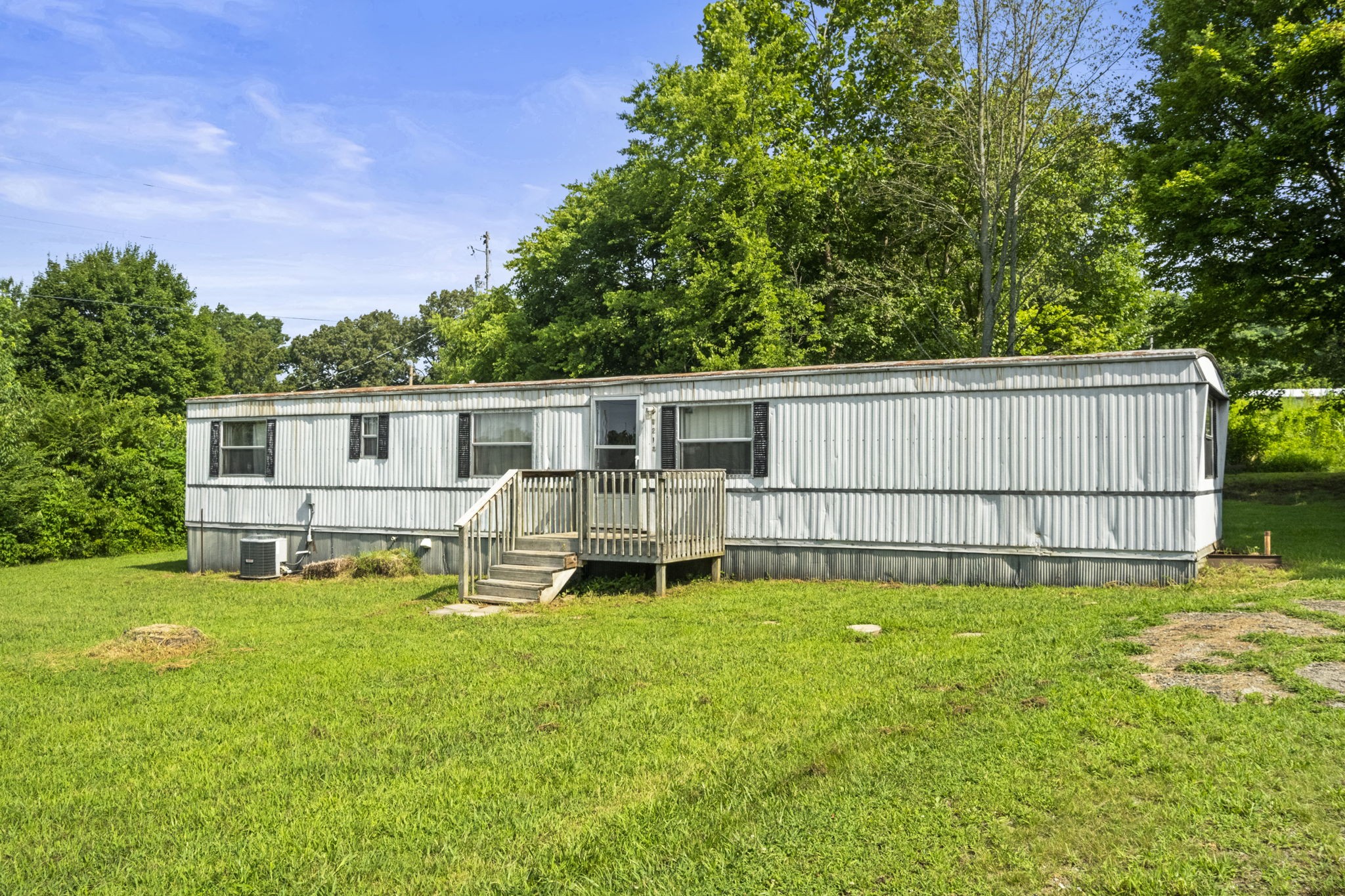 6214 Lincoln Park Road Springfield, TN 37172 - Photo 9 of 25 front view of a house with a yard and a porch