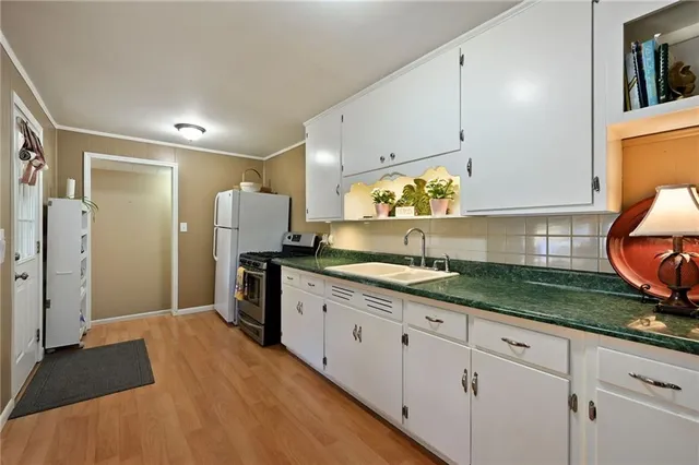 $295,000 | 7601 Foster Street, Overland Park, KS 66204