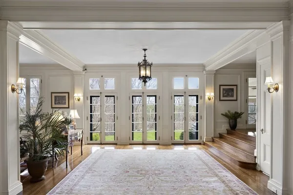 a view of livingroom with hardwood floor and a ceiling fan