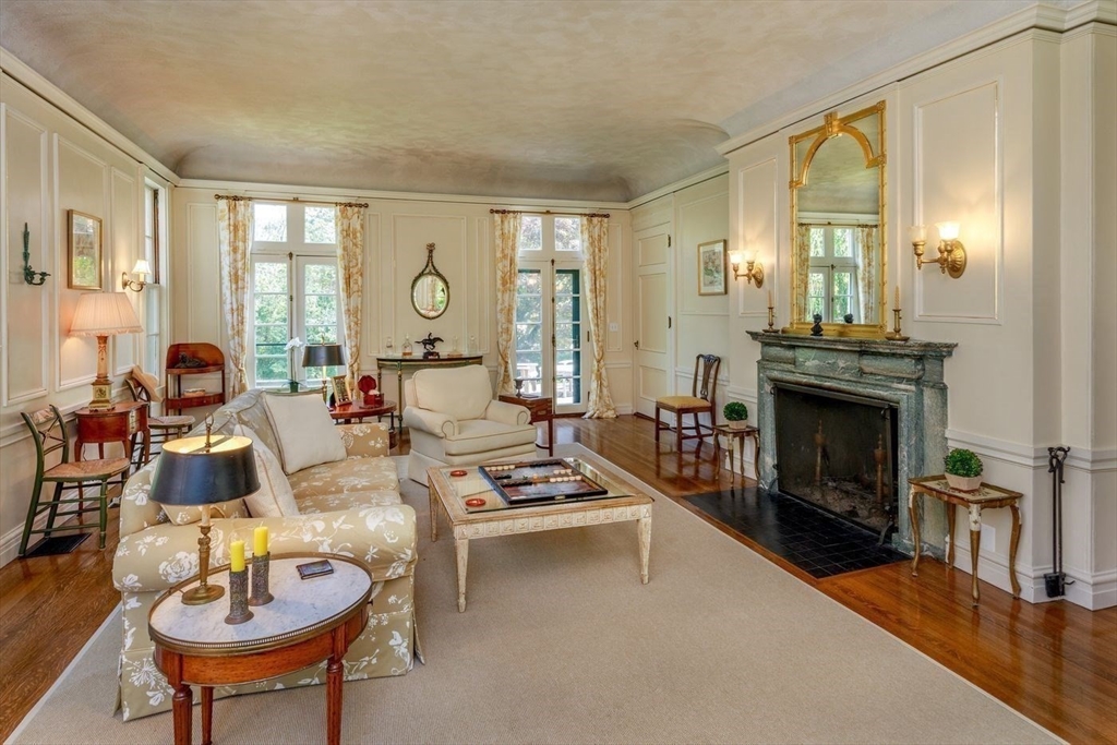 5 Main Drive Wenham, MA 01984 - Photo 15 of 37 a living room with furniture and a fireplace