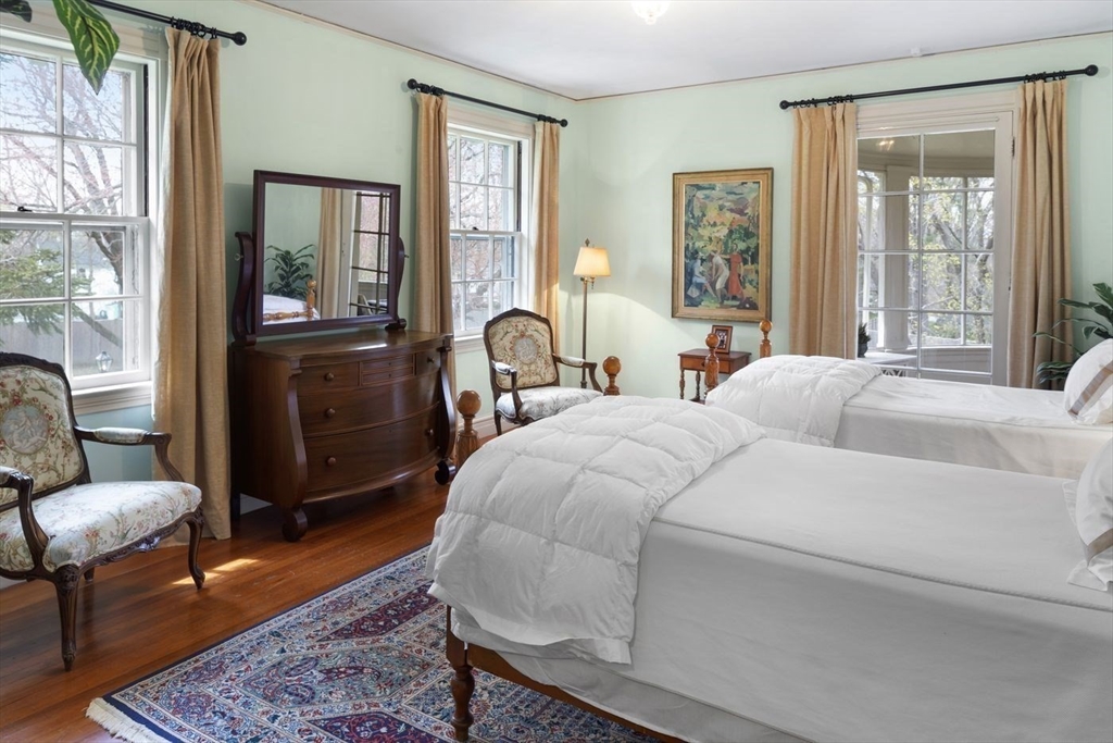 5 Main Drive Wenham, MA 01984 - Photo 30 of 37 a bed room with a bed and a chair