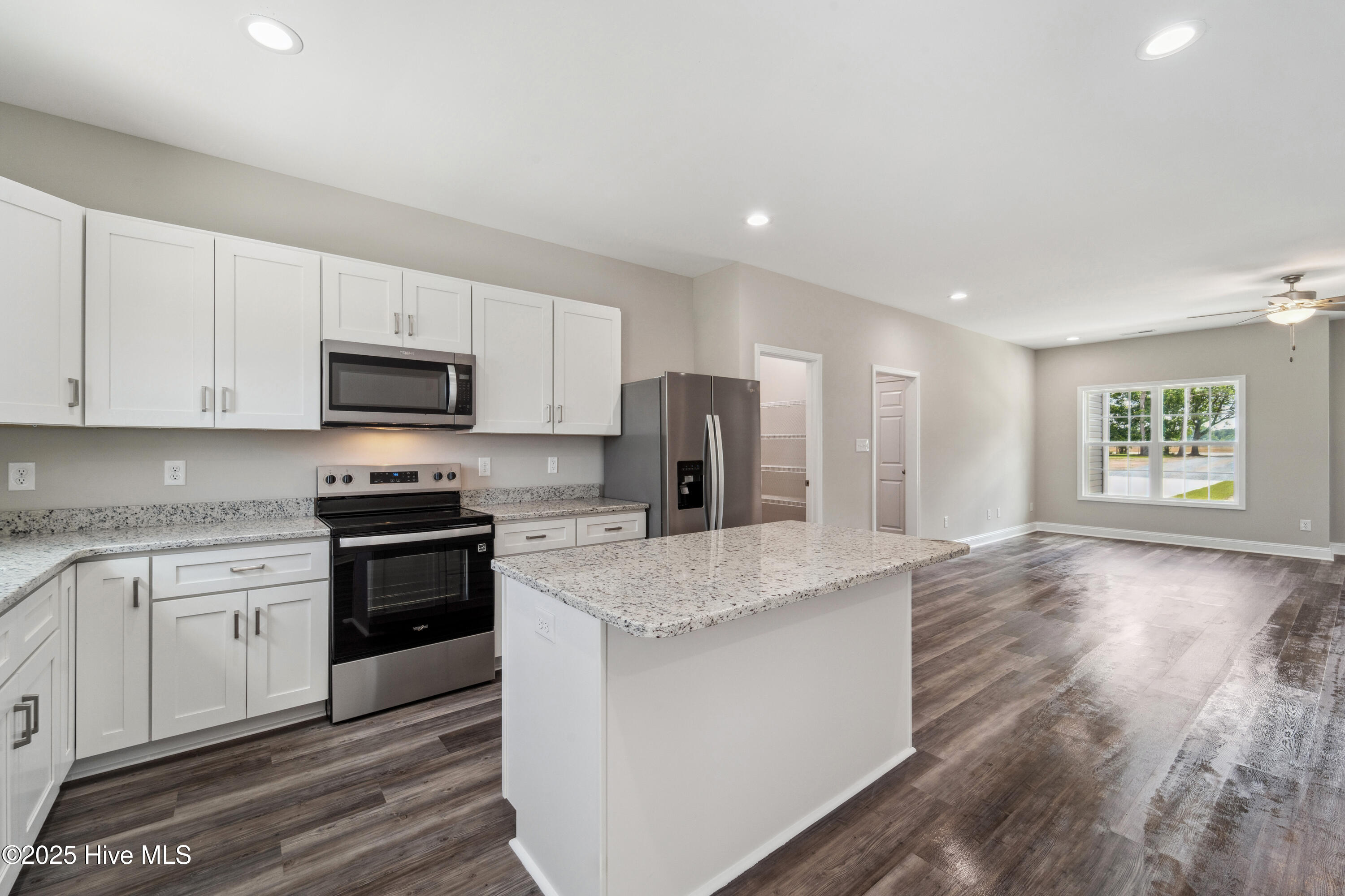 688 South Corn Mill Road Beulaville, NC 28518 - Photo 12 of 61 Kitchen Island with Bar Stool Seating Area