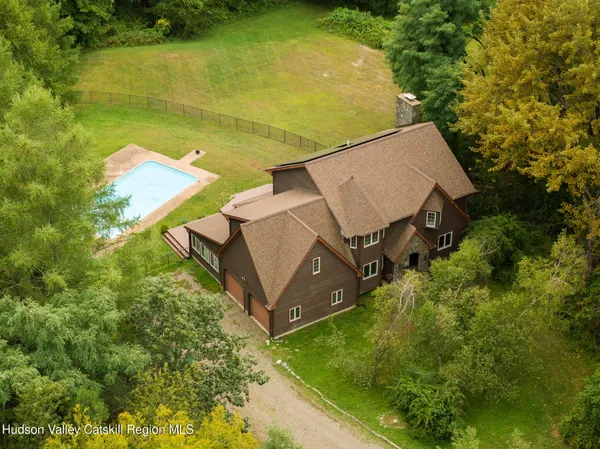 an aerial view of a pool