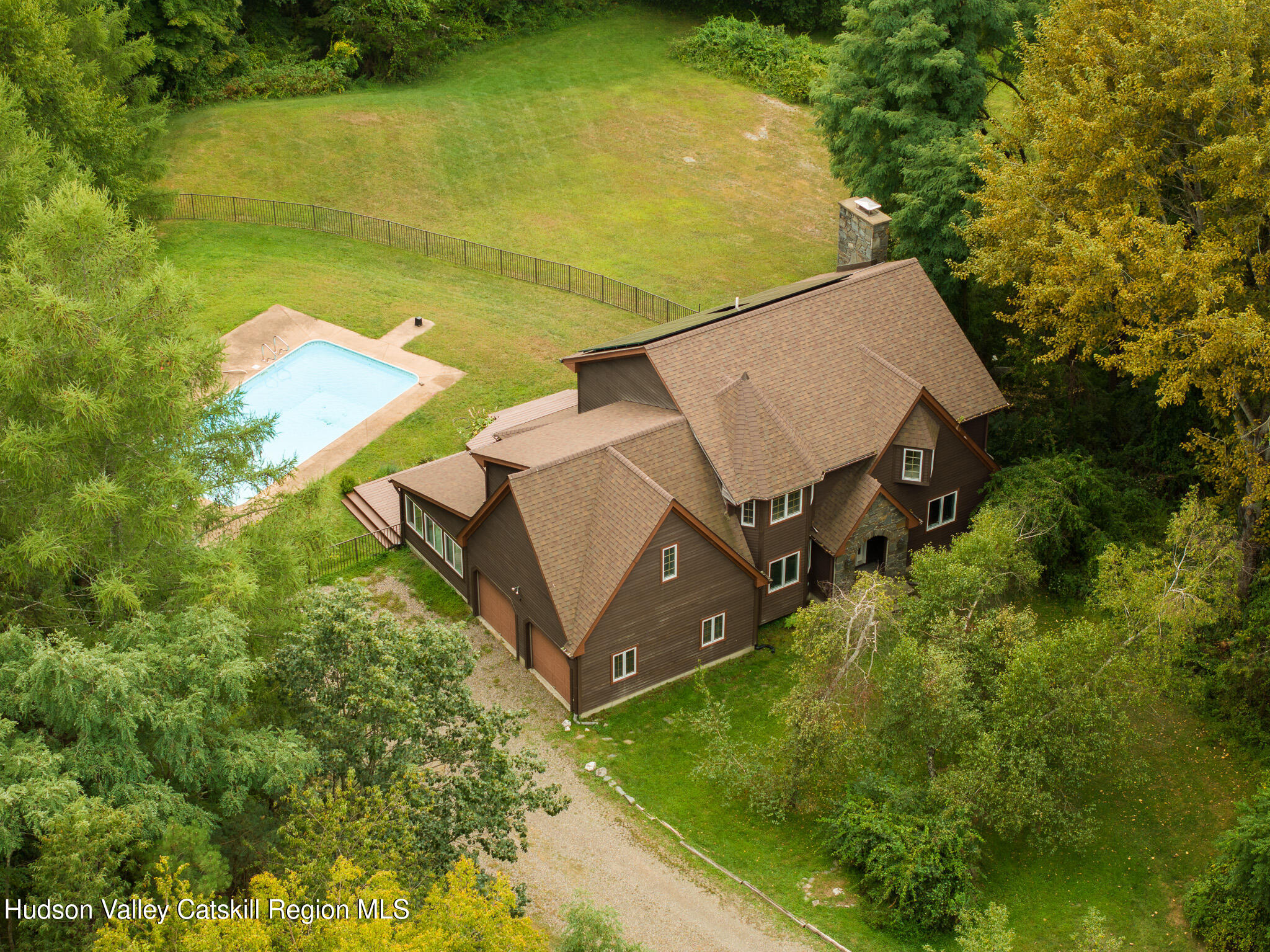 an aerial view of a pool