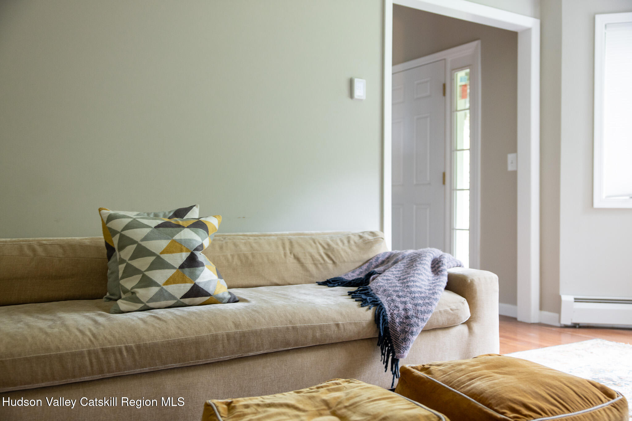 46 Webster Coon Road Red Hook, NY 12571 - Photo 14 of 27 a living room with a couch and a window