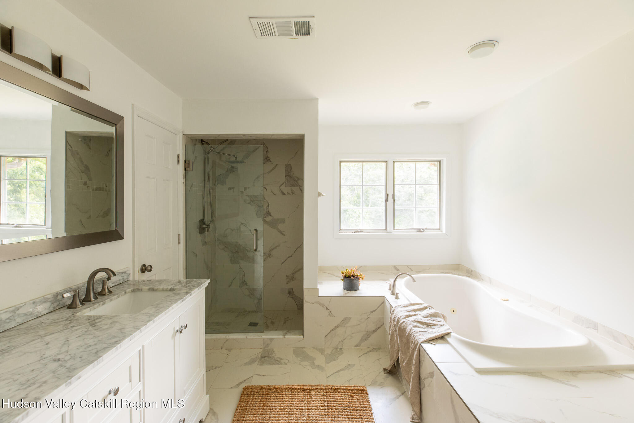 46 Webster Coon Road Red Hook, NY 12571 - Photo 17 of 27 a bathroom with a granite countertop sink and a bathtub