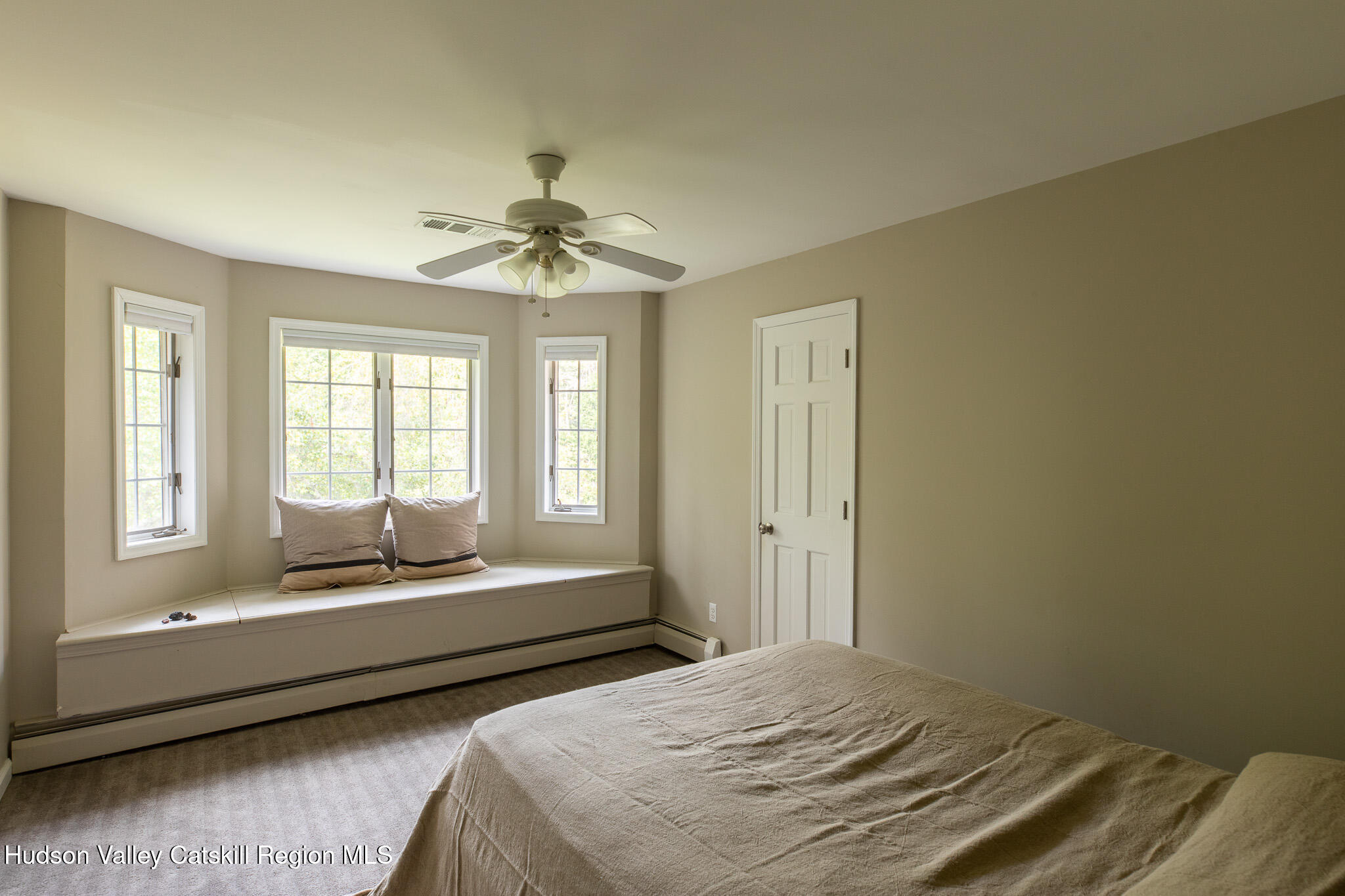 46 Webster Coon Road Red Hook, NY 12571 - Photo 19 of 27 a bedroom with a bed and a window