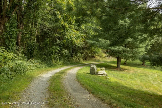 a view of a lake with a yard