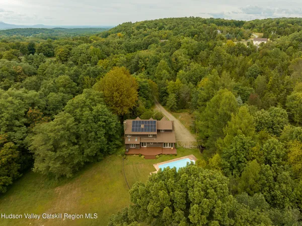 a view of a houses with a yard