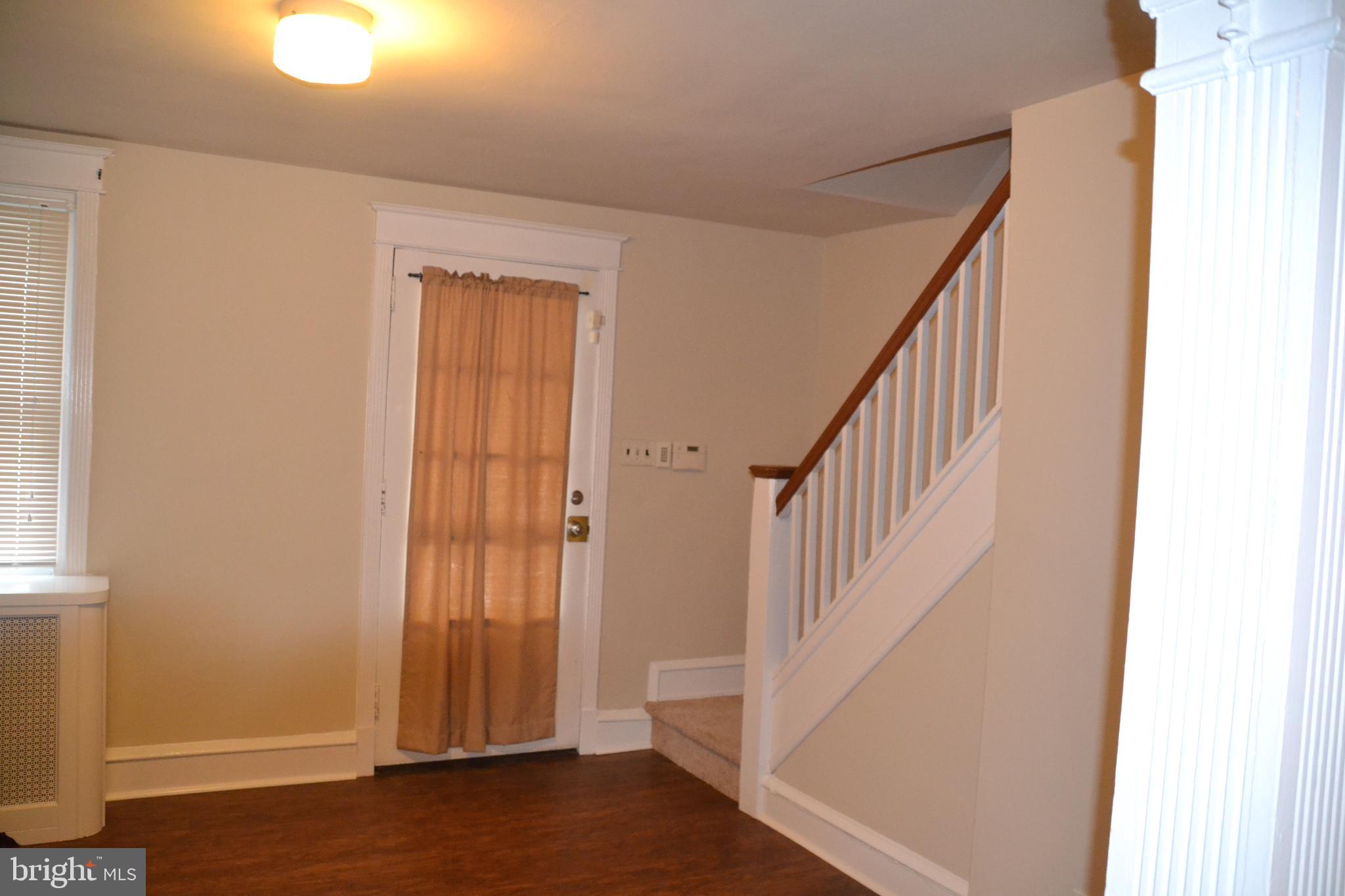 7042 Clinton Road Upper Darby, PA 19082 - Photo 12 of 33 a view of an entryway with wooden floor