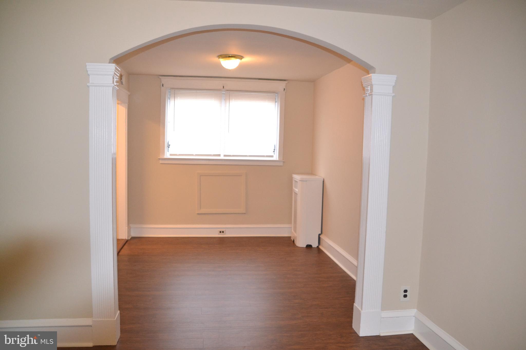 7042 Clinton Road Upper Darby, PA 19082 - Photo 14 of 33 an empty room with a window