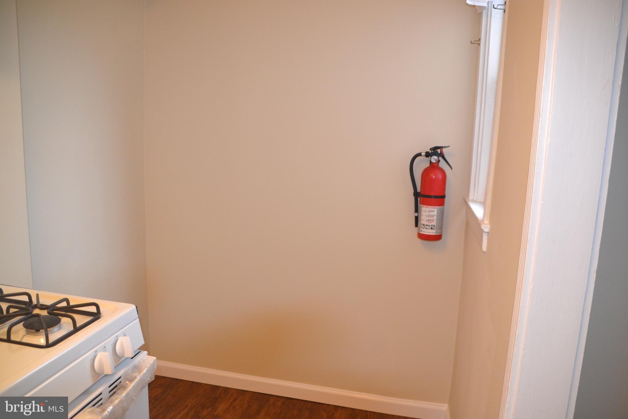 7042 Clinton Road Upper Darby, PA 19082 - Photo 17 of 33 a bathroom with a sink and cabinets