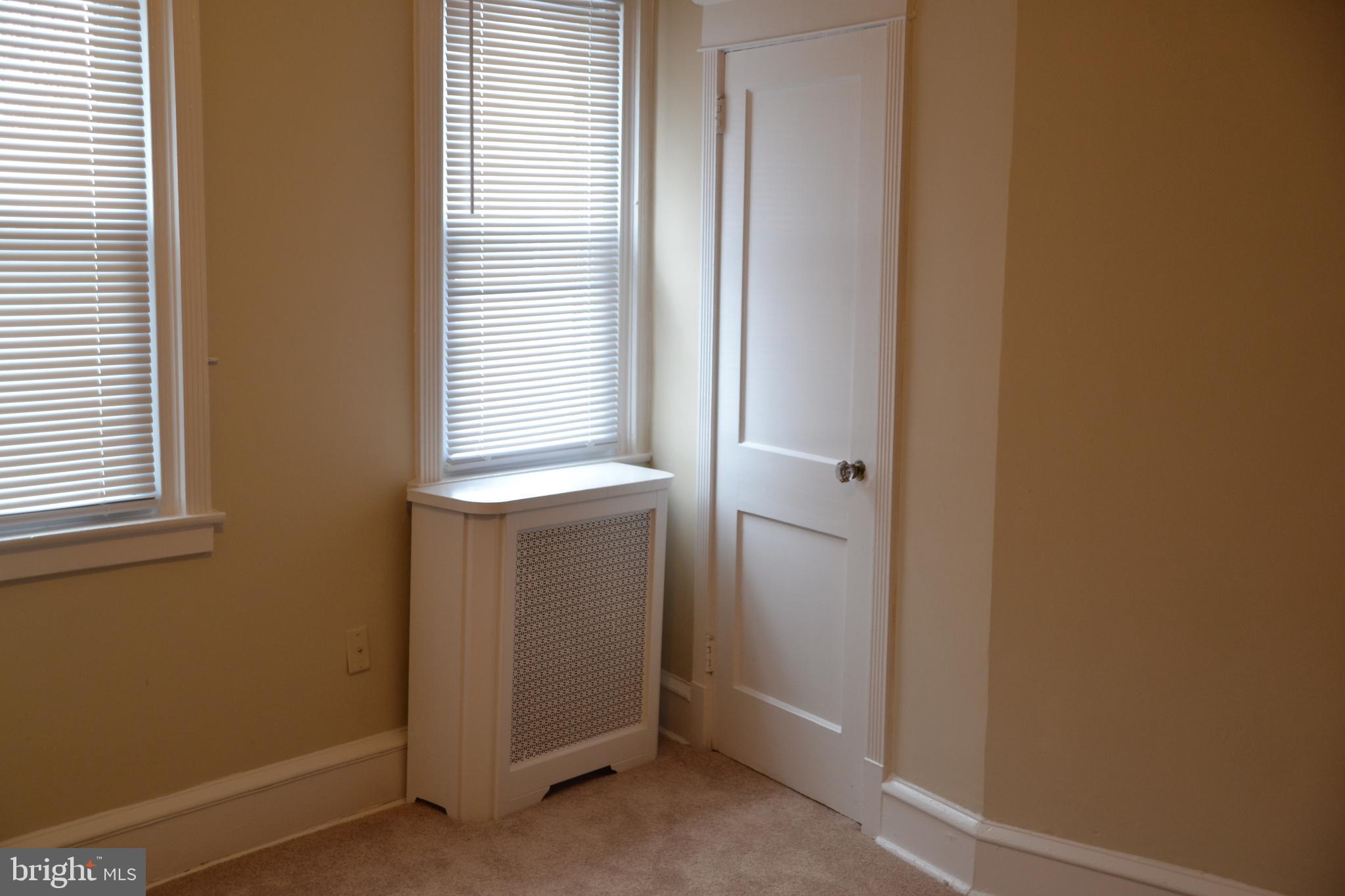 7042 Clinton Road Upper Darby, PA 19082 - Photo 26 of 33 a view of an empty room with a window