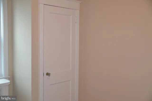 a view of a bedroom with a window