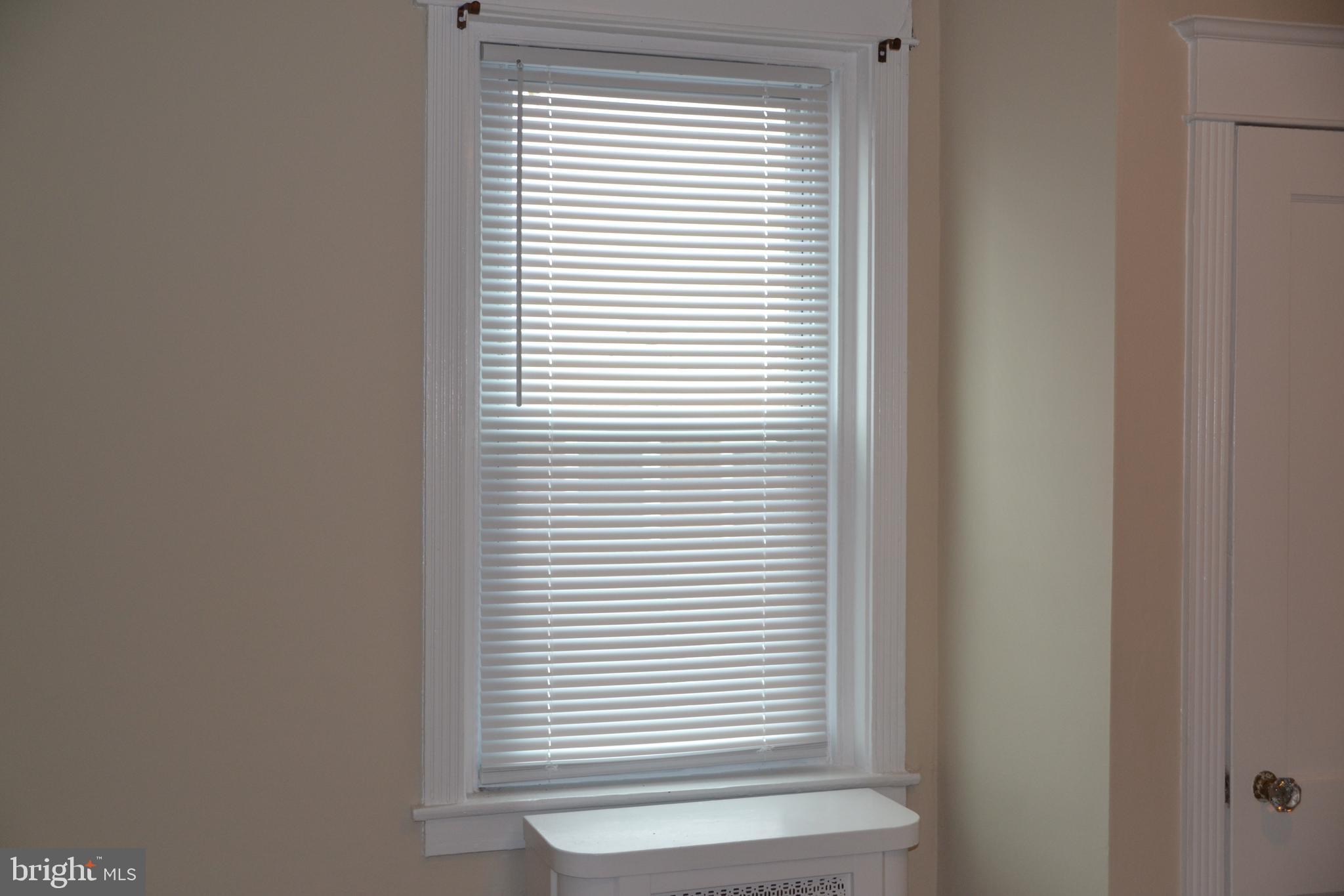 7042 Clinton Road Upper Darby, PA 19082 - Photo 32 of 33 a view of a bedroom with a window