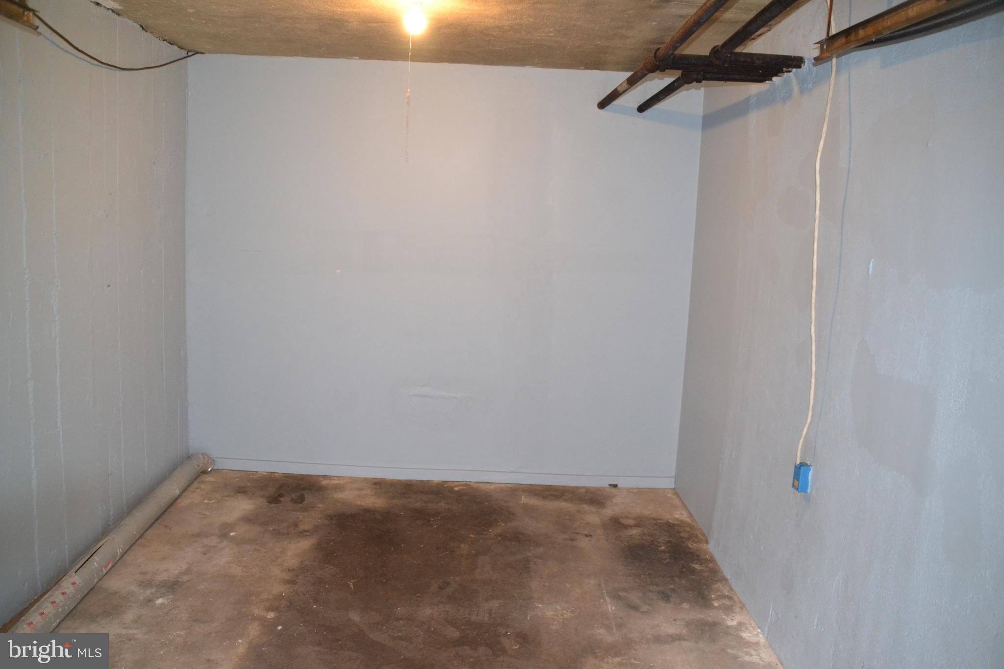 7042 Clinton Road Upper Darby, PA 19082 - Photo 5 of 33 a view of a room with racks on the wall