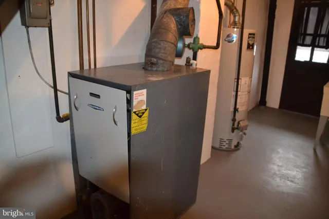 a view of hallway with chandelier