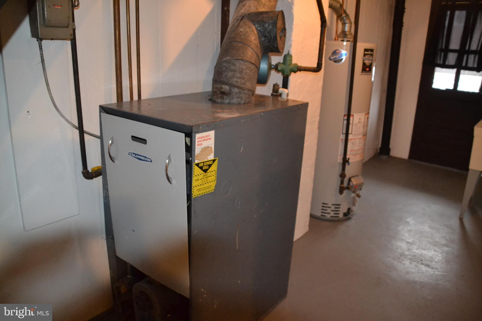 7042 Clinton Road Upper Darby, PA 19082 - Photo 8 of 33 a view of water heater room
