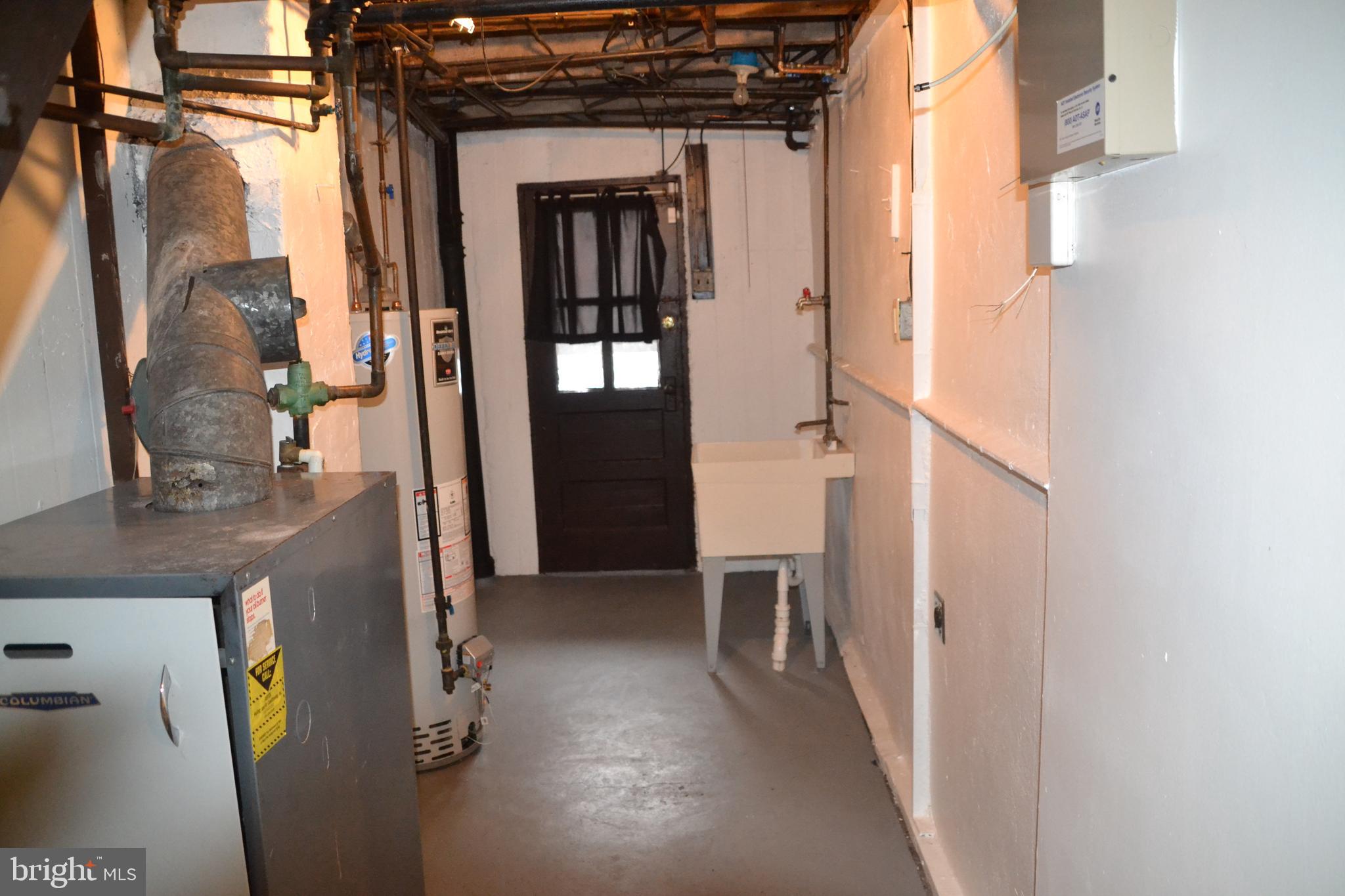 7042 Clinton Road Upper Darby, PA 19082 - Photo 9 of 33 a view of hallway with chandelier