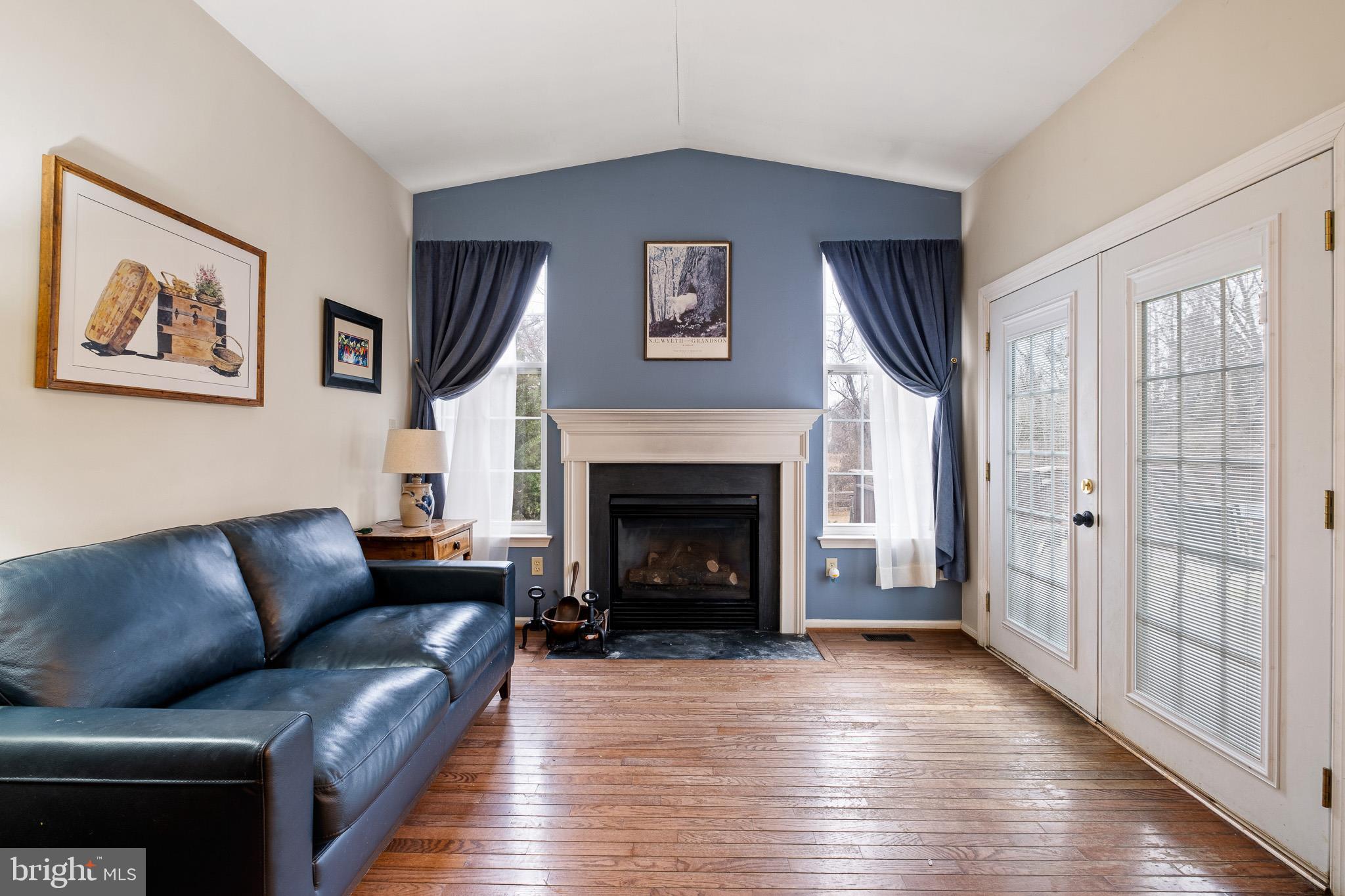 224 West Old Squaw Road Middletown, DE 19709 - Photo 20 of 43 a living room with furniture and a fireplace