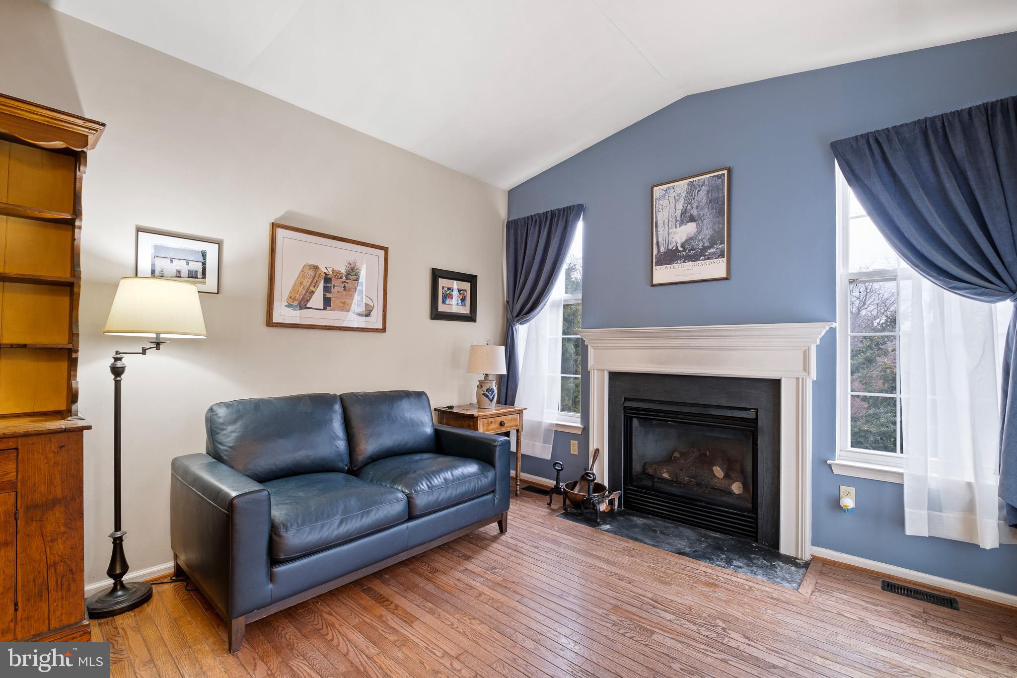 224 West Old Squaw Road Middletown, DE 19709 - Photo 22 of 43 a living room with furniture and a fireplace