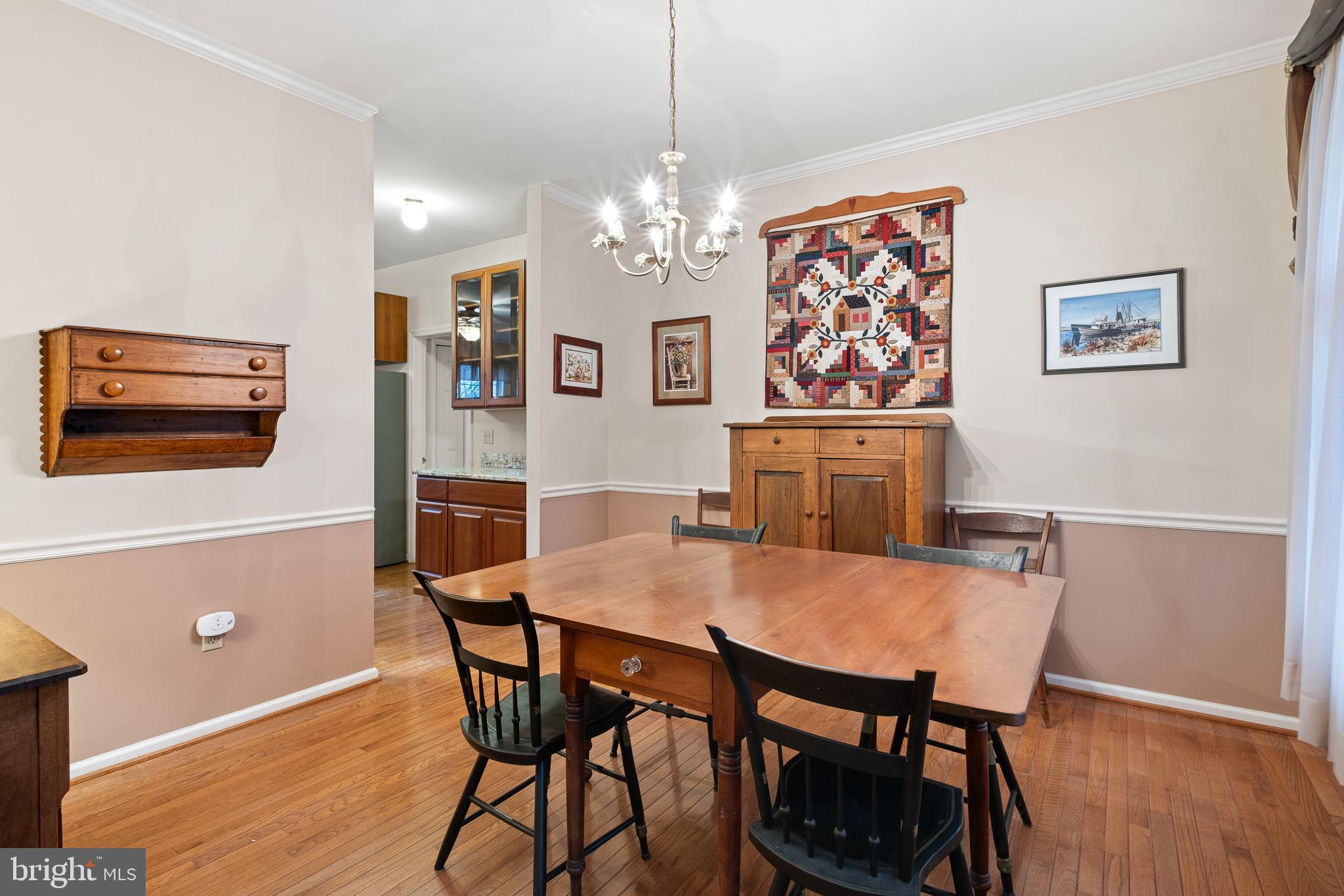 224 West Old Squaw Road Middletown, DE 19709 - Photo 25 of 43 a view of a dining room with furniture and wooden floor